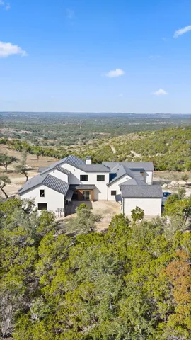 a aerial view of residential houses with outdoor space