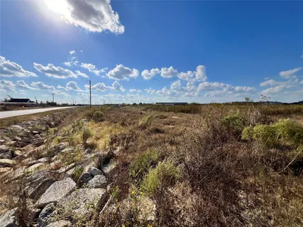a view of a lake from a yard
