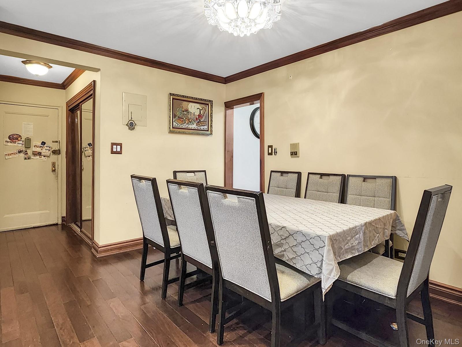 66-10 149th Street, Unit 1A Queens, NY 11367 - Photo 4 of 10 a view of a dining room with furniture and wooden floor