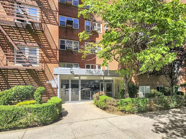 front view of a building and a garden