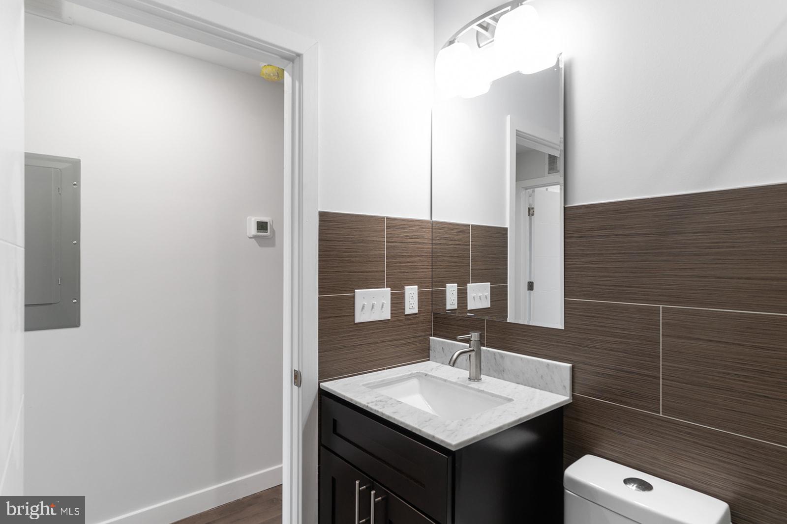 1947 North 7th Street, Unit 2 Philadelphia, PA 19122 - Photo 12 of 31 a bathroom with a sink and a mirror