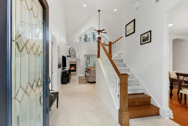 a bathroom with a bathtub a toilet and a shower