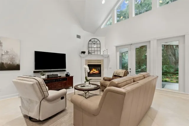 a bathroom with a shower curtain and a sink