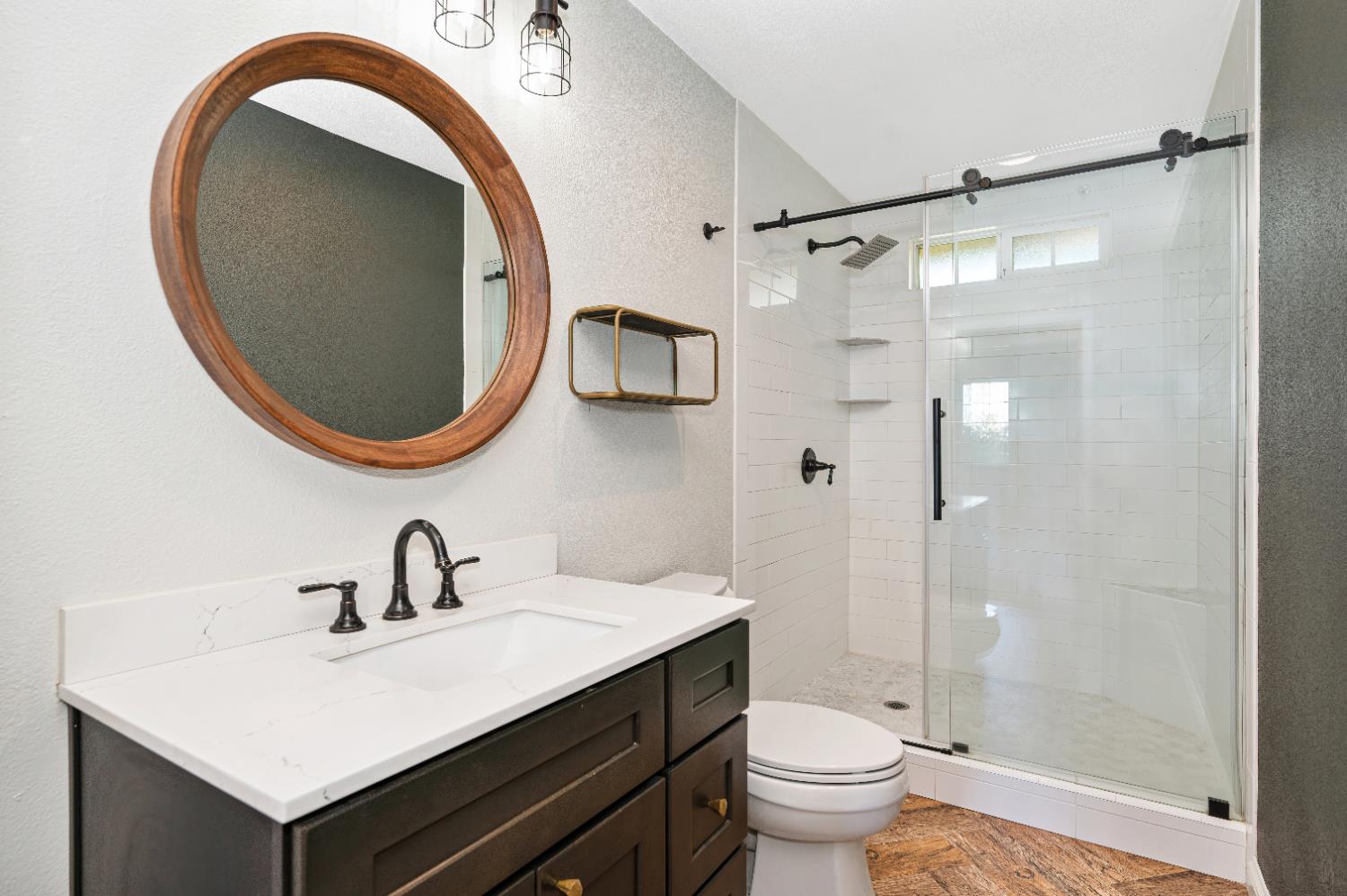 12260 Angle Road Herald, CA 95638 - Photo 12 of 43 a bathroom with a sink and a mirror