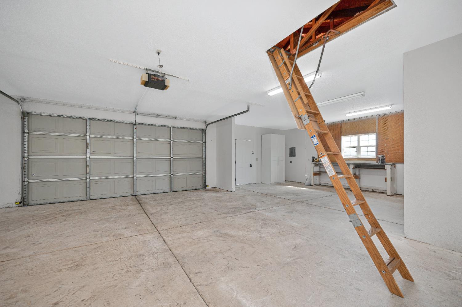 12260 Angle Road Herald, CA 95638 - Photo 21 of 43 a view of a livingroom with an empty space and a ceiling fan