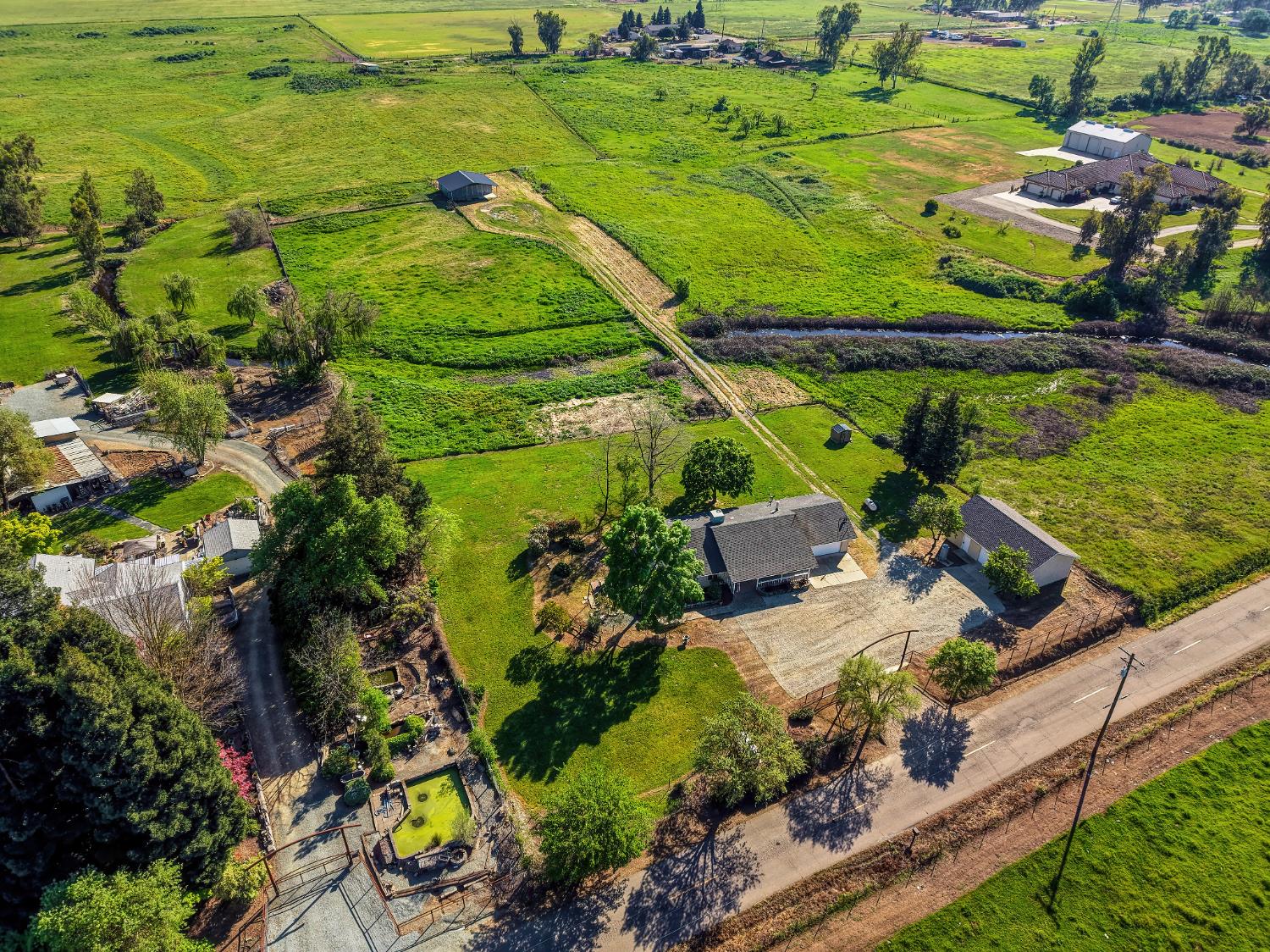 12260 Angle Road Herald, CA 95638 - Photo 24 of 43 a view of a garden with a tree