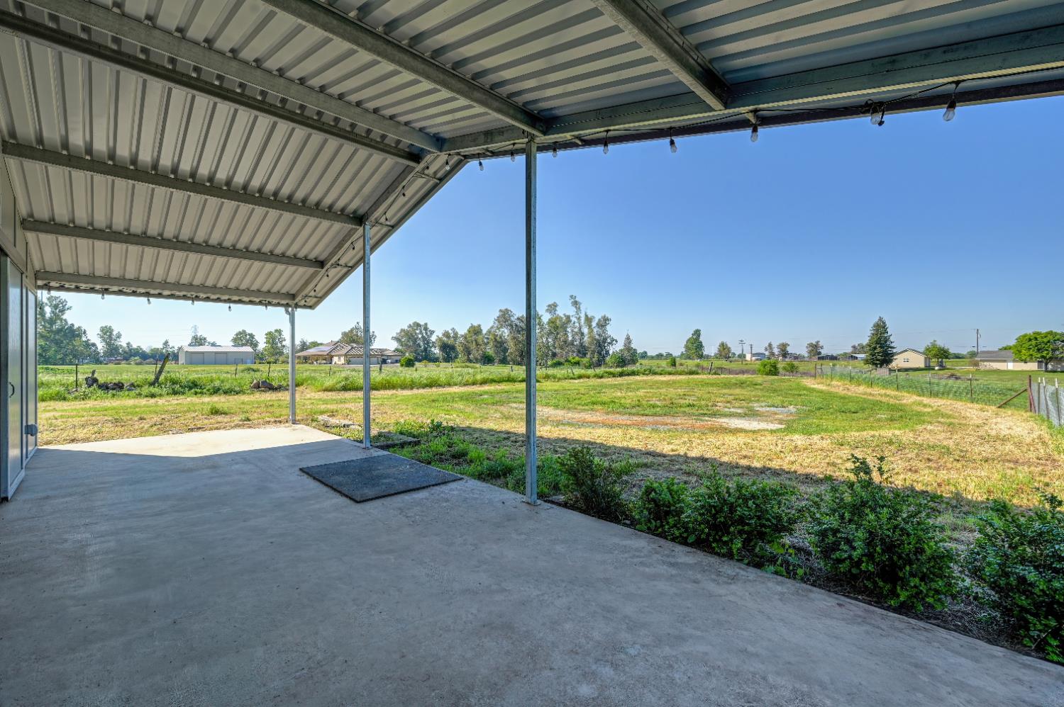 12260 Angle Road Herald, CA 95638 - Photo 28 of 43 a view of a swimming pool with yard from a ceiling fan