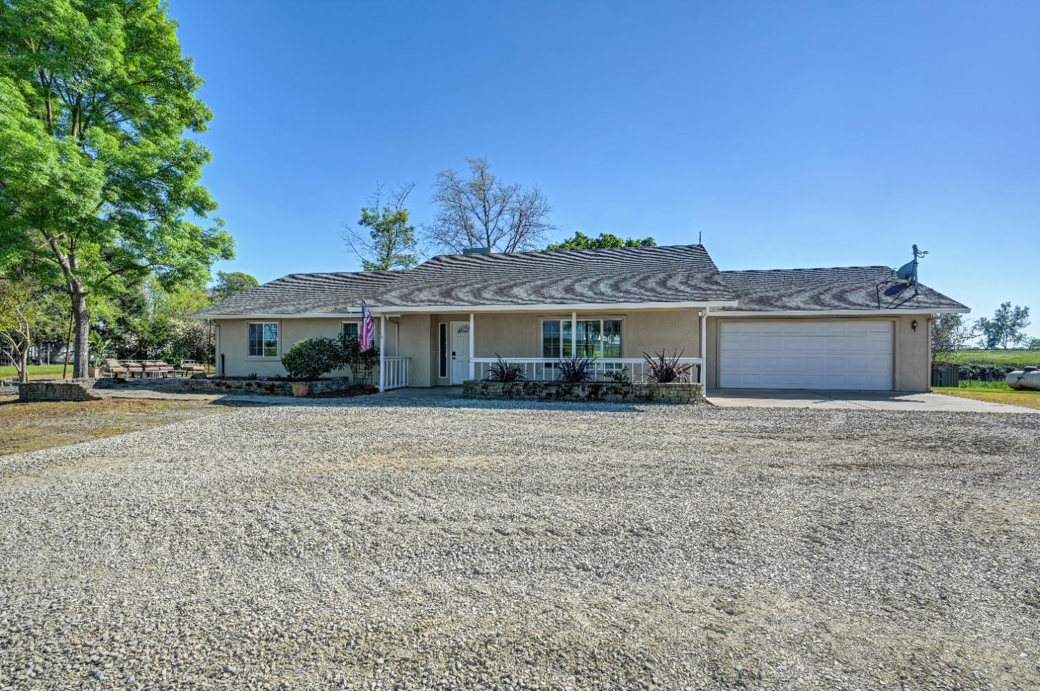 12260 Angle Road Herald, CA 95638 - Photo 43 of 43 a front view of a house with a garden