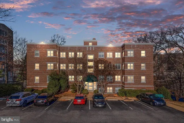 a cars parked in front of a building