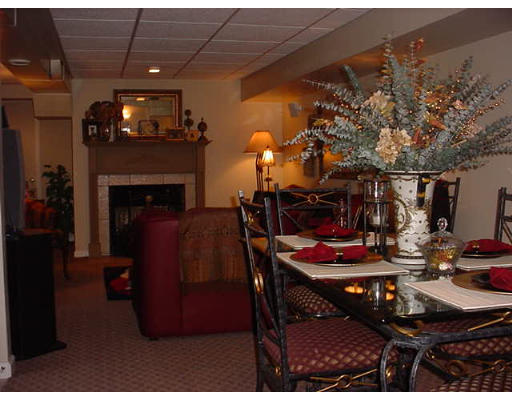 191 Overlook Drive Springfield, MA 01118 - Photo 12 of 12 a view of a dining room with furniture and chandelier