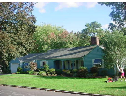 191 Overlook Drive Springfield, MA 01118 - Photo 3 of 12 a front view of a house with a yard and potted plants