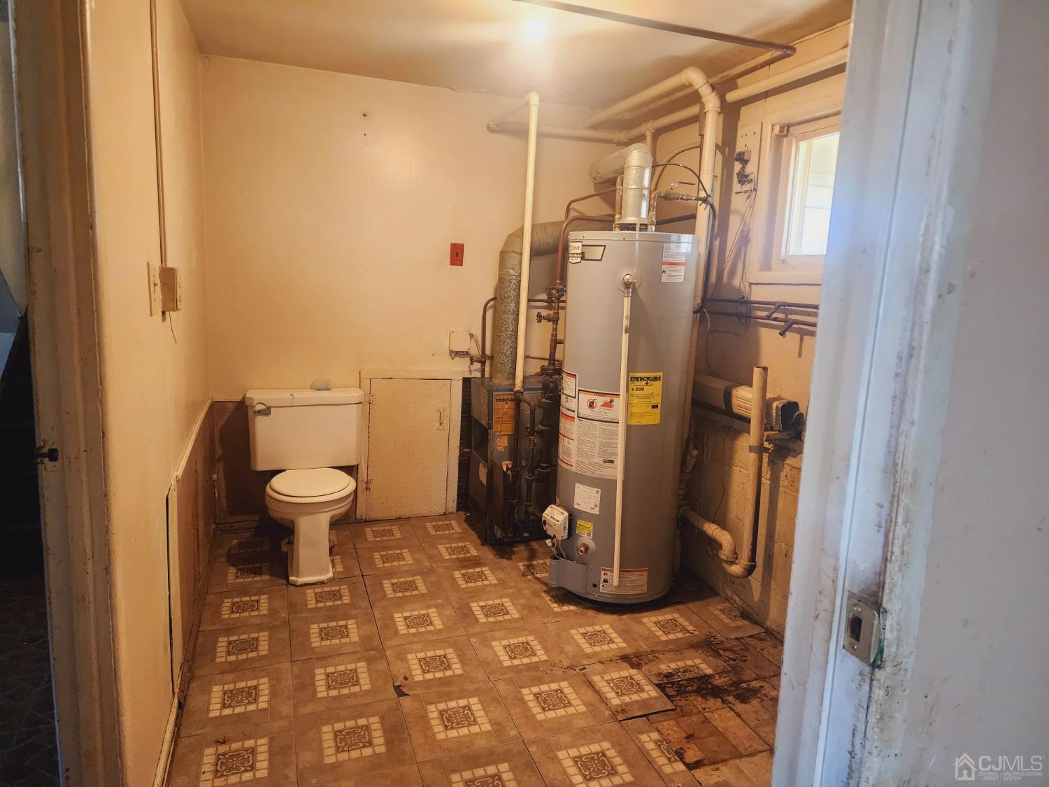 8 Eastlick Road Edison, NJ 08817 - Photo 7 of 15 a bathroom with a toilet and a shower
