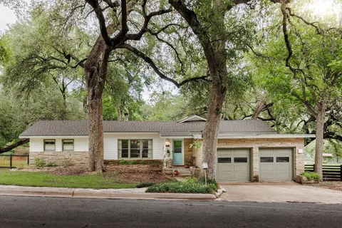 front view of a house with a street
