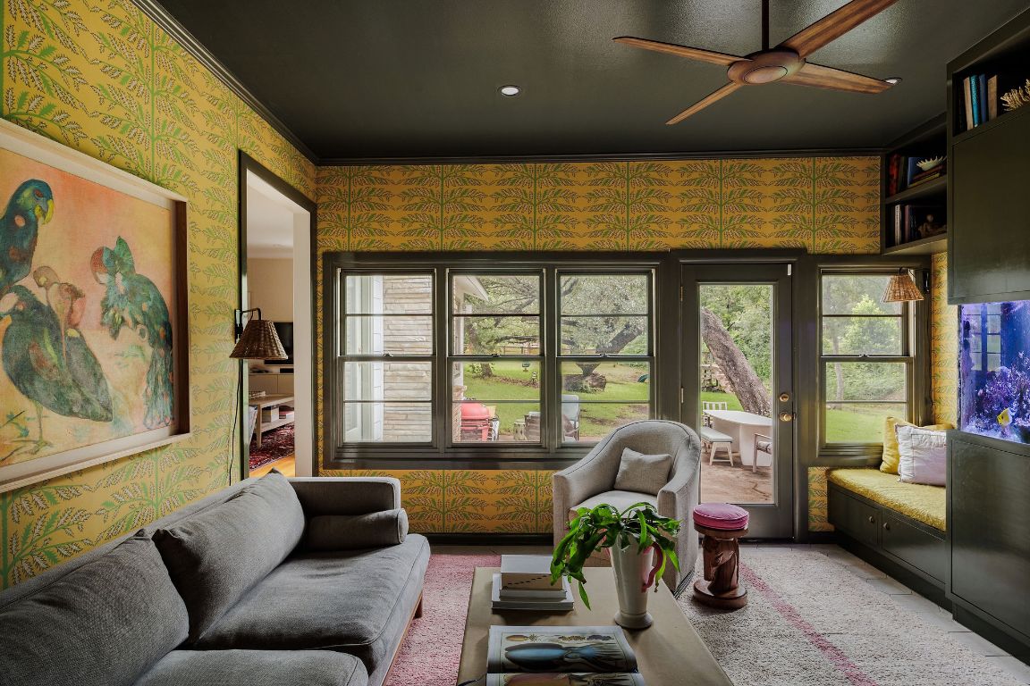 4201 Gregg Ward Lane Austin, TX 78744 - Photo 11 of 40 a living room with furniture and a large window