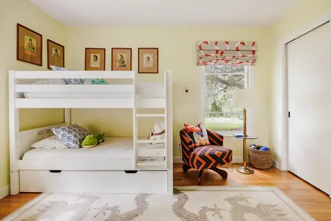 a bedroom with furniture and a bed