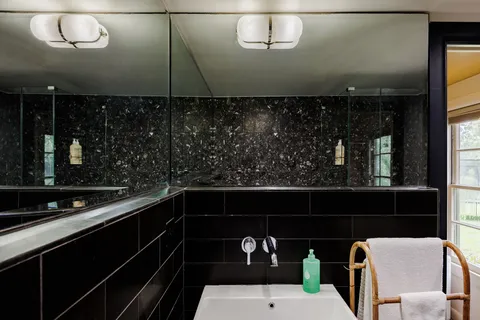 a kitchen with a sink and cabinets