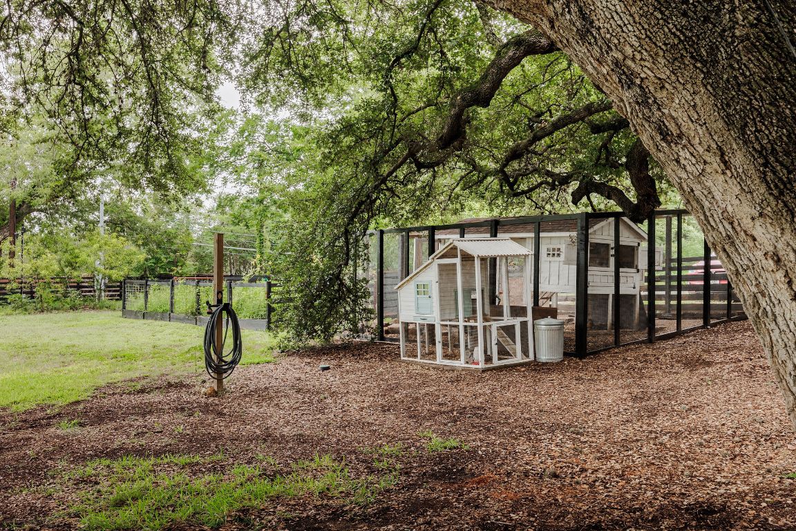 4201 Gregg Ward Lane Austin, TX 78744 - Photo 27 of 40 a view of a house with a yard