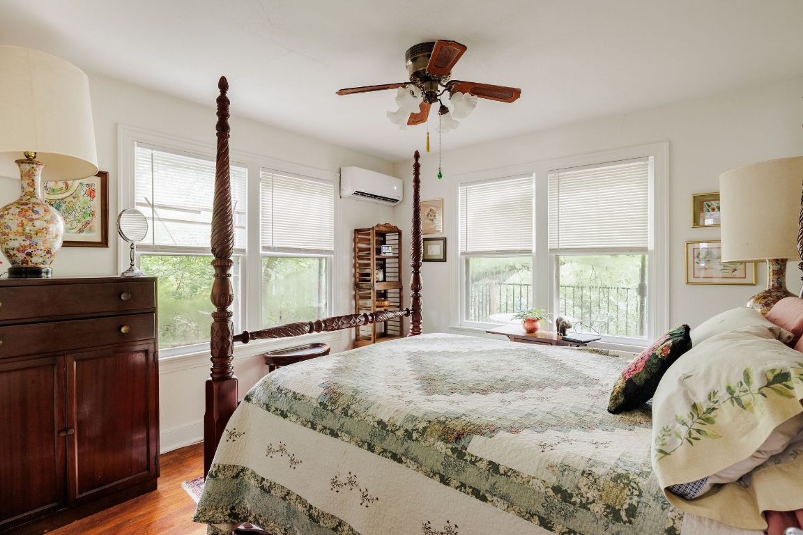 4201 Gregg Ward Lane Austin, TX 78744 - Photo 33 of 40 a bedroom with a bed and a window