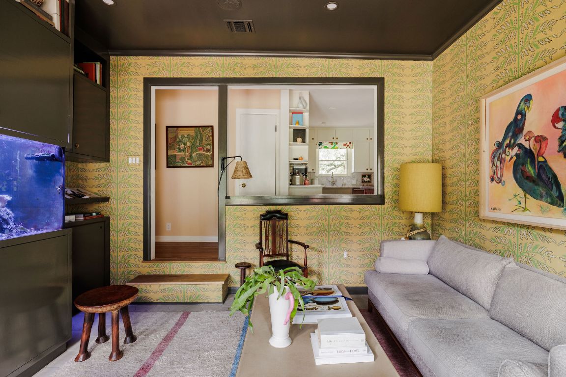 4201 Gregg Ward Lane Austin, TX 78744 - Photo 9 of 40 a living room with furniture and a potted plant