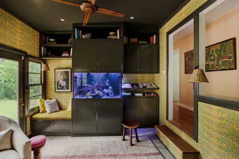 a living room with furniture and a window