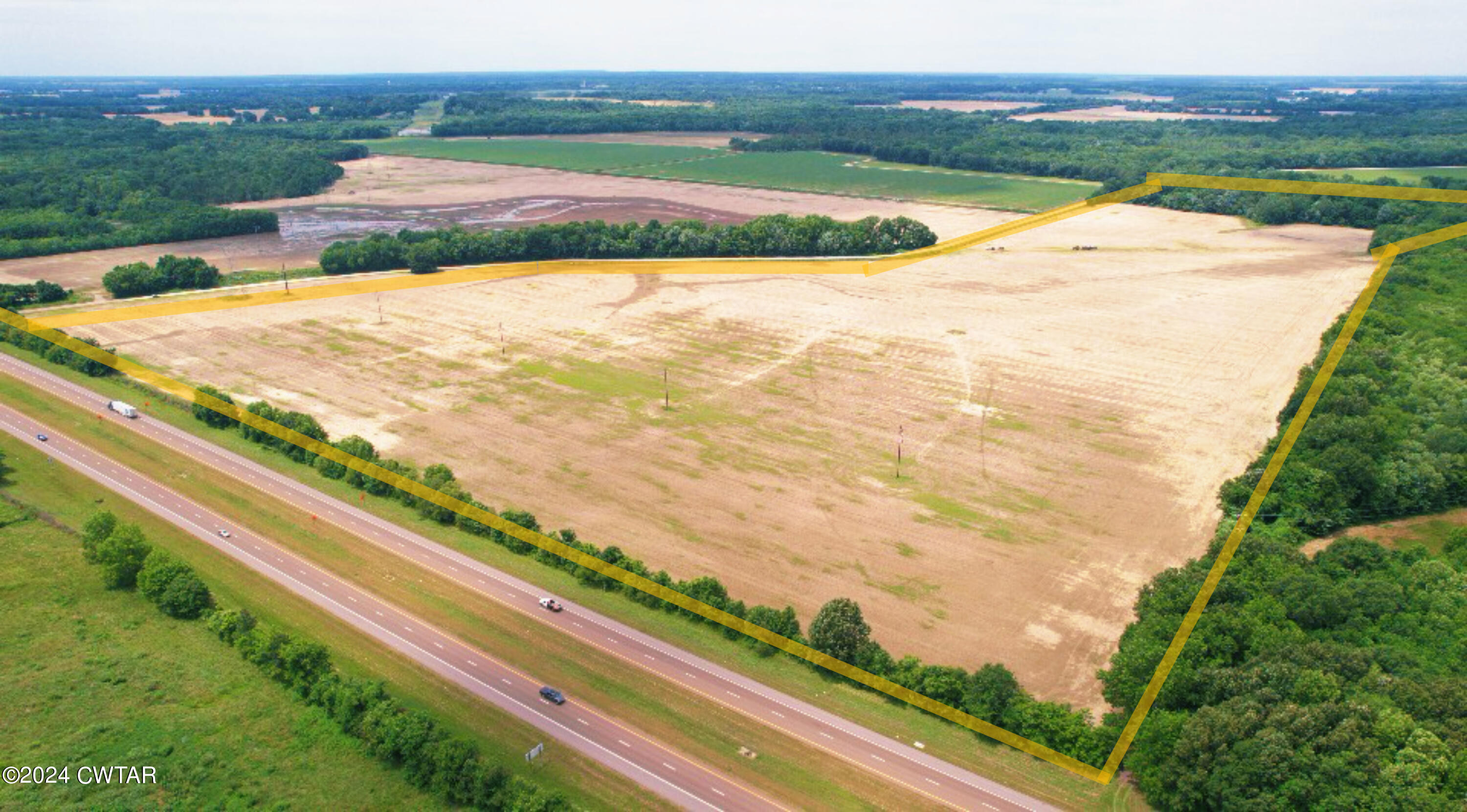 0 Slaughter Pen Road Dyersburg, TN 38024 - Photo 2 of 7 a view of an outdoor space and deck