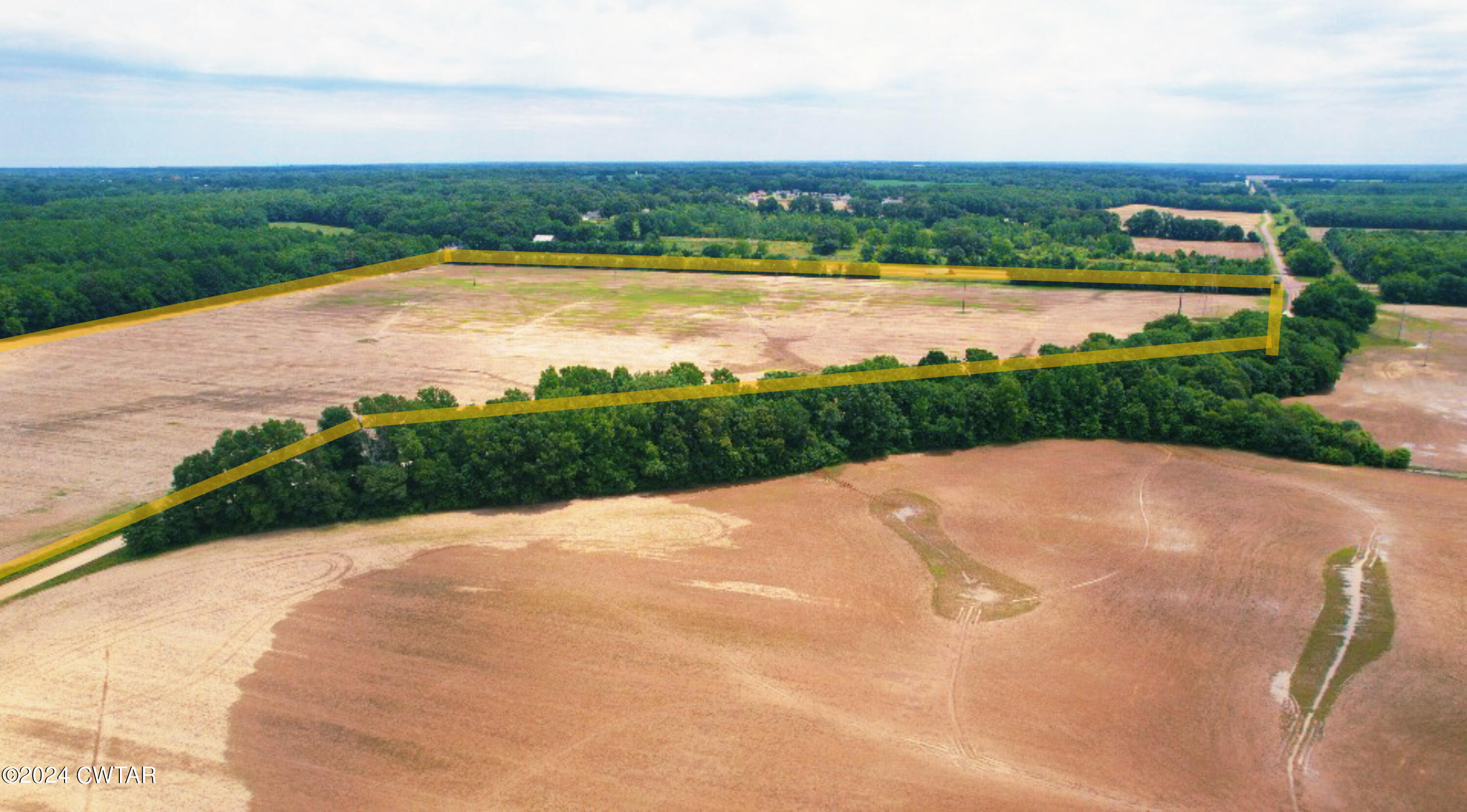 0 Slaughter Pen Road Dyersburg, TN 38024 - Photo 7 of 7 a view of a lake with a big yard