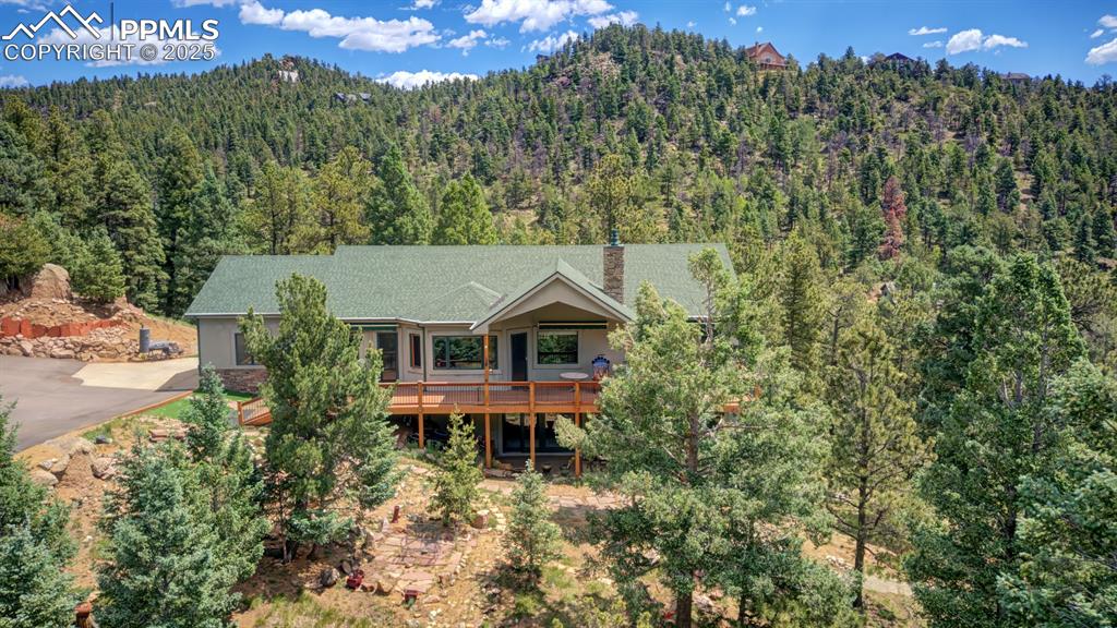 6104 Coffee Pot Road Manitou Springs, CO 80829 - Photo 1 of 49 an aerial view of a house