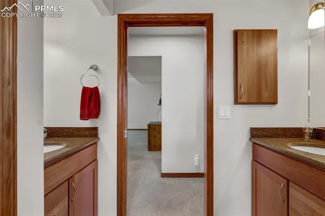 a kitchen with a sink and a stove
