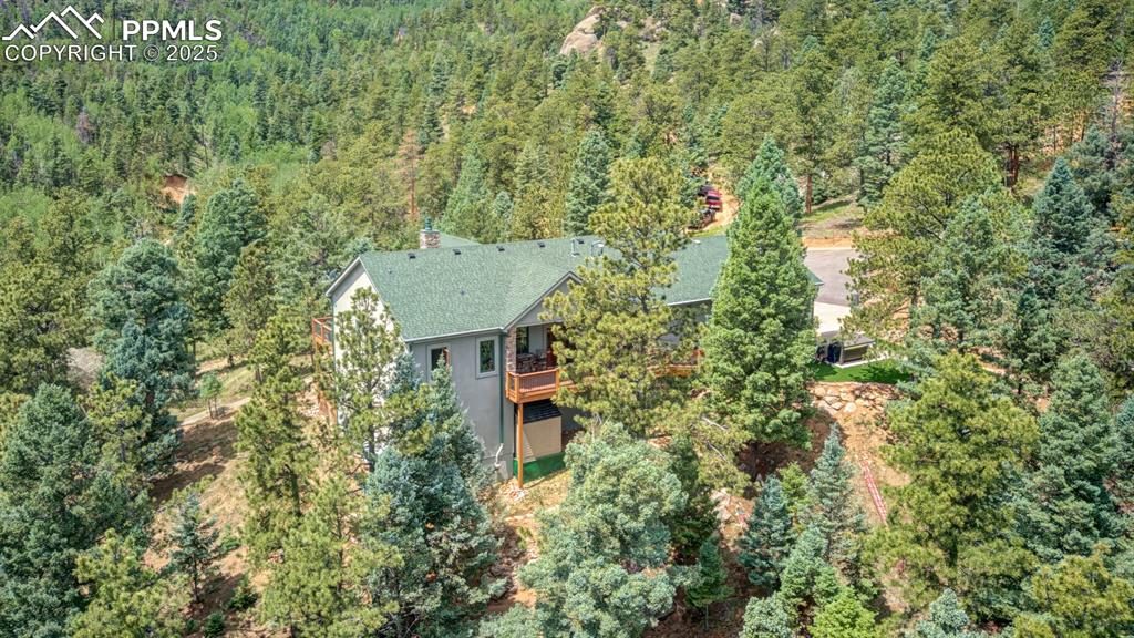 6104 Coffee Pot Road Manitou Springs, CO 80829 - Photo 44 of 49 an aerial view of a house with yard