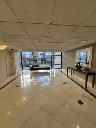a view of a living room and dining room