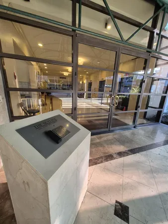 a view of living room and kitchen with furniture