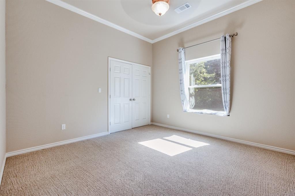 Undisclosed Address Valley View, TX 76272 - Photo 10 of 12 an empty room with windows and closet