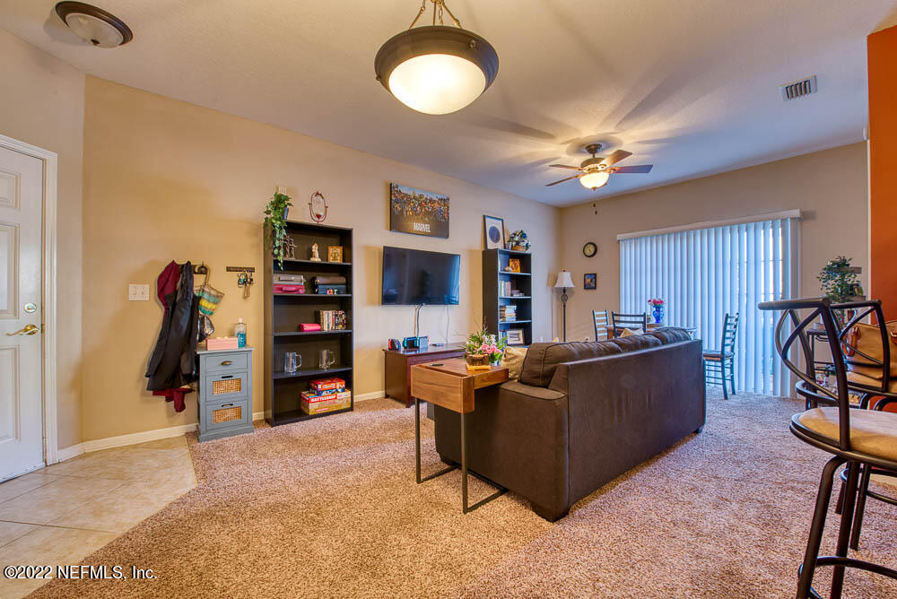 8226 Green Parrot Road, Unit 105 Jacksonville, FL 32256 - Photo 2 of 17 Living Room - View 2