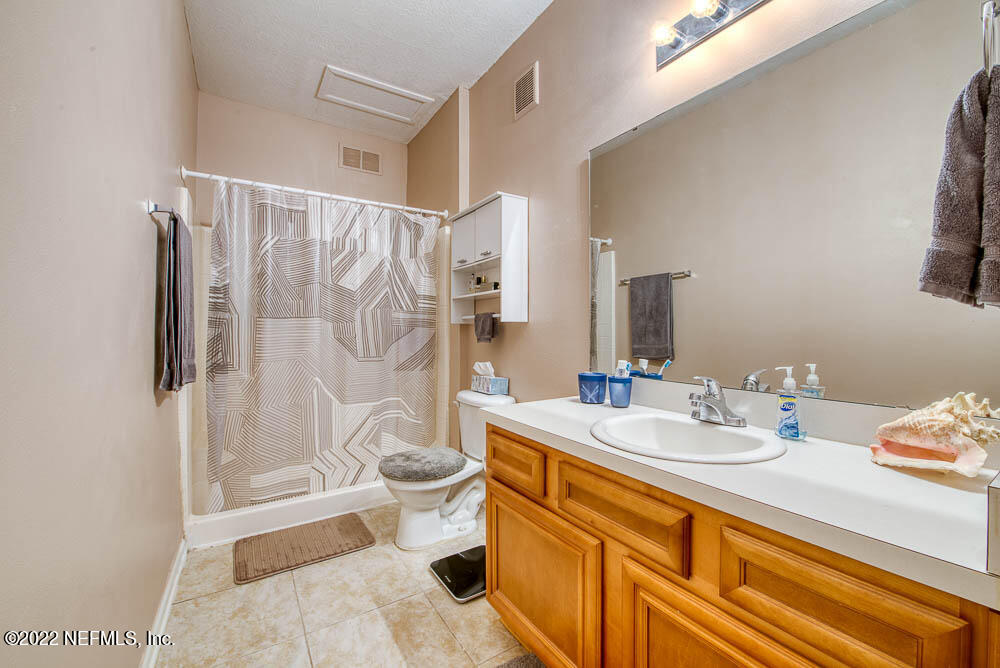 8226 Green Parrot Road, Unit 105 Jacksonville, FL 32256 - Photo 7 of 17 Master Bathroom