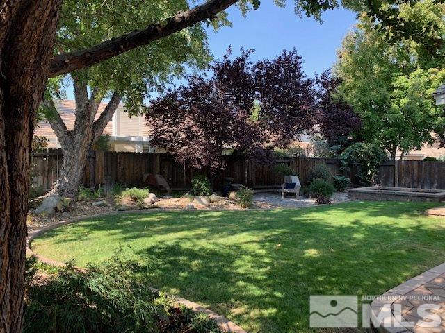 1551 Bramble Court Reno, NV 89509 - Photo 22 of 30 a view of a swimming pool with a garden