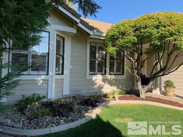 1551 Bramble Court Reno, NV 89509 - Photo 28 of 30 a front view of a house with garden