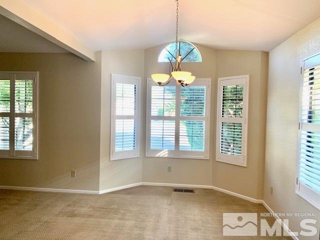 1551 Bramble Court Reno, NV 89509 - Photo 9 of 30 wooden floor in an empty room with a window