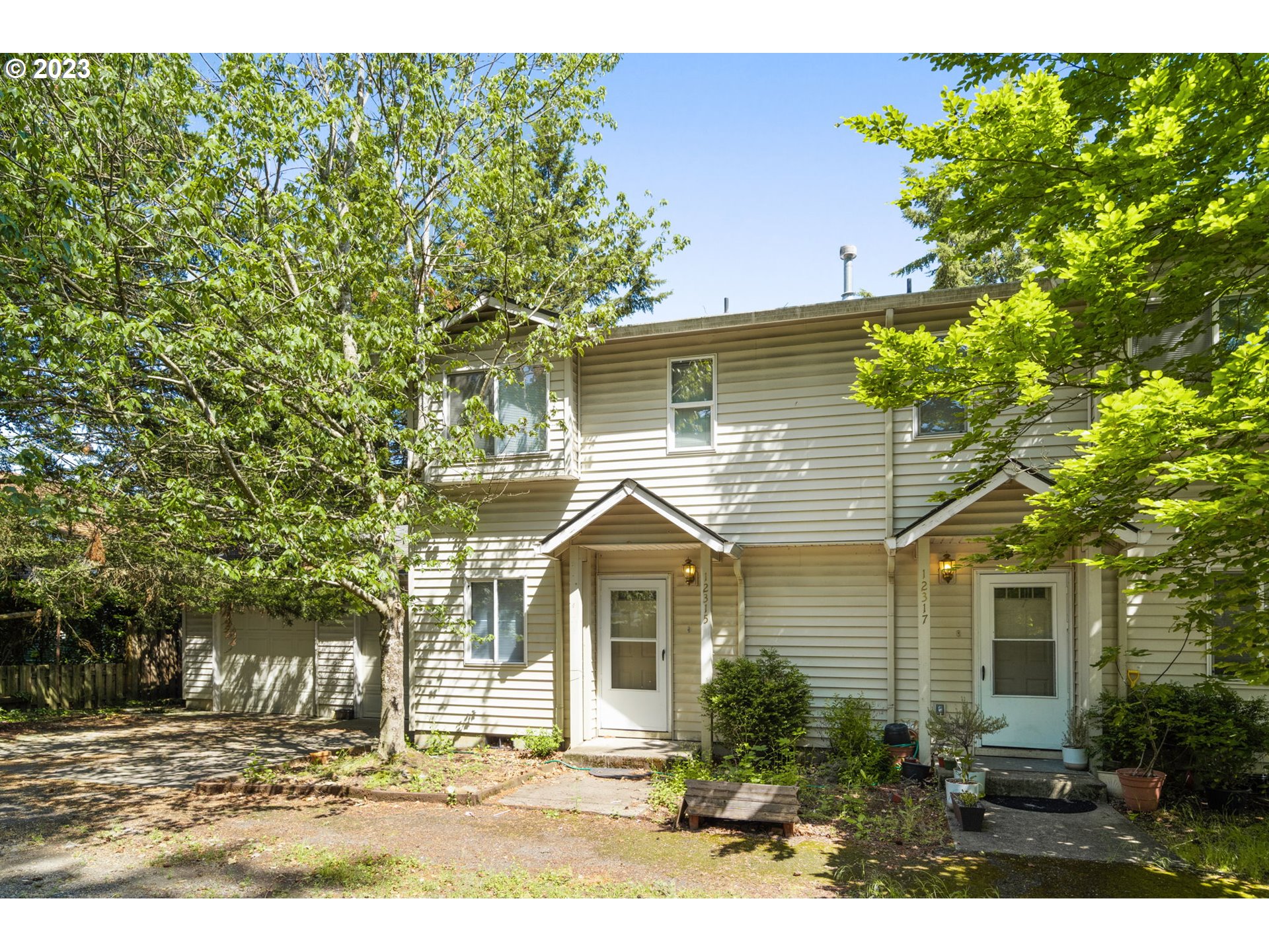 12315 Southeast Boise Street Portland, OR 97236 - Photo 2 of 23 a view of house with yard