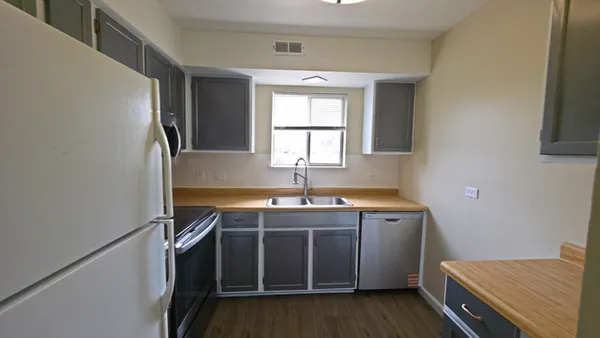 a room with a sink and a window