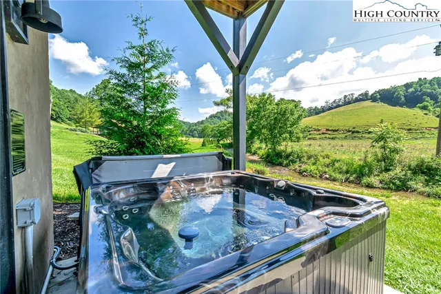 swimming pool view with a outdoor seating