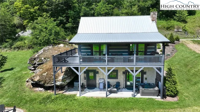 a view of house with garden and entryway