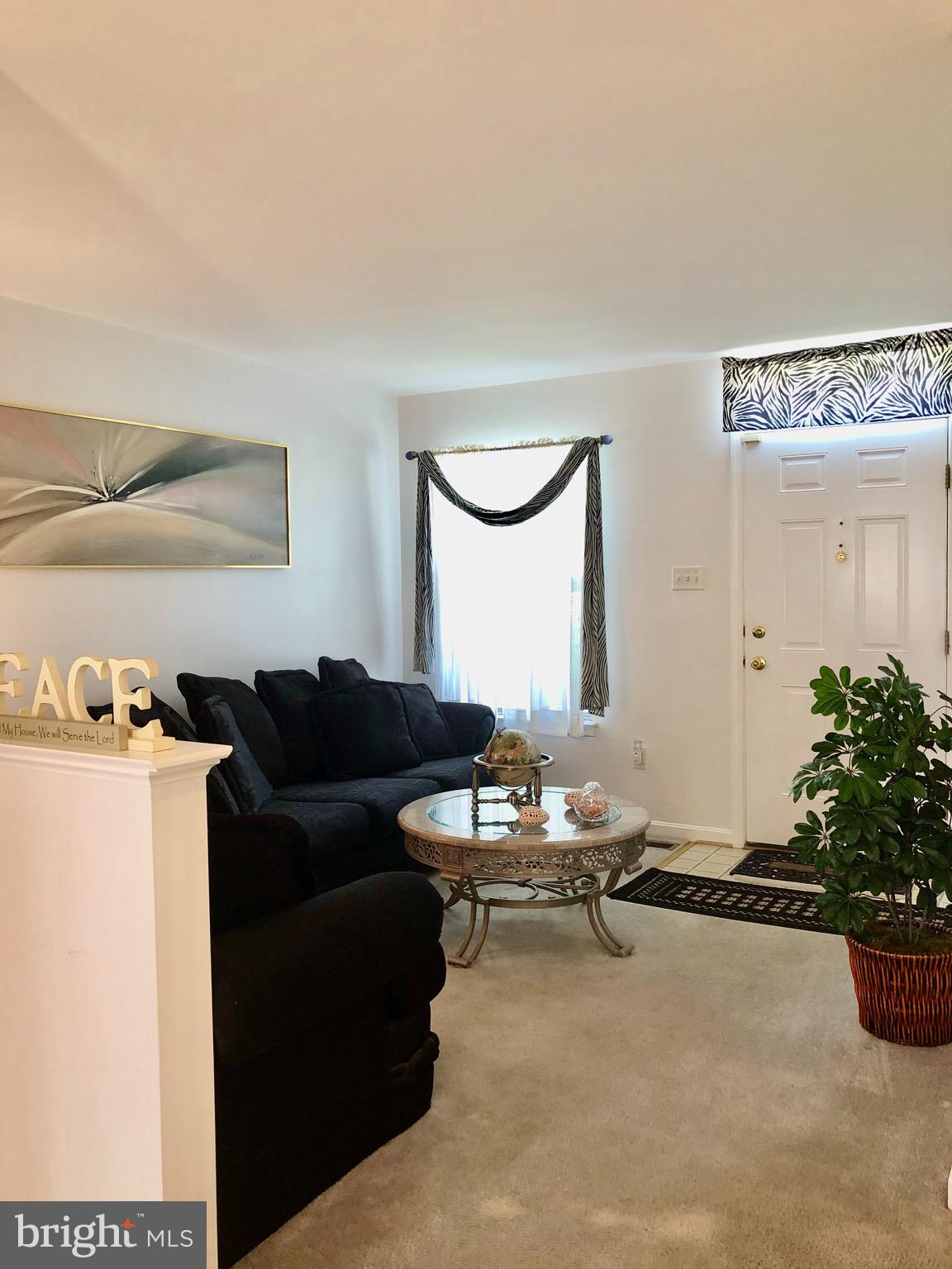 3201 Kelox Road Baltimore, MD 21207 - Photo 3 of 30 Bright and open living room
