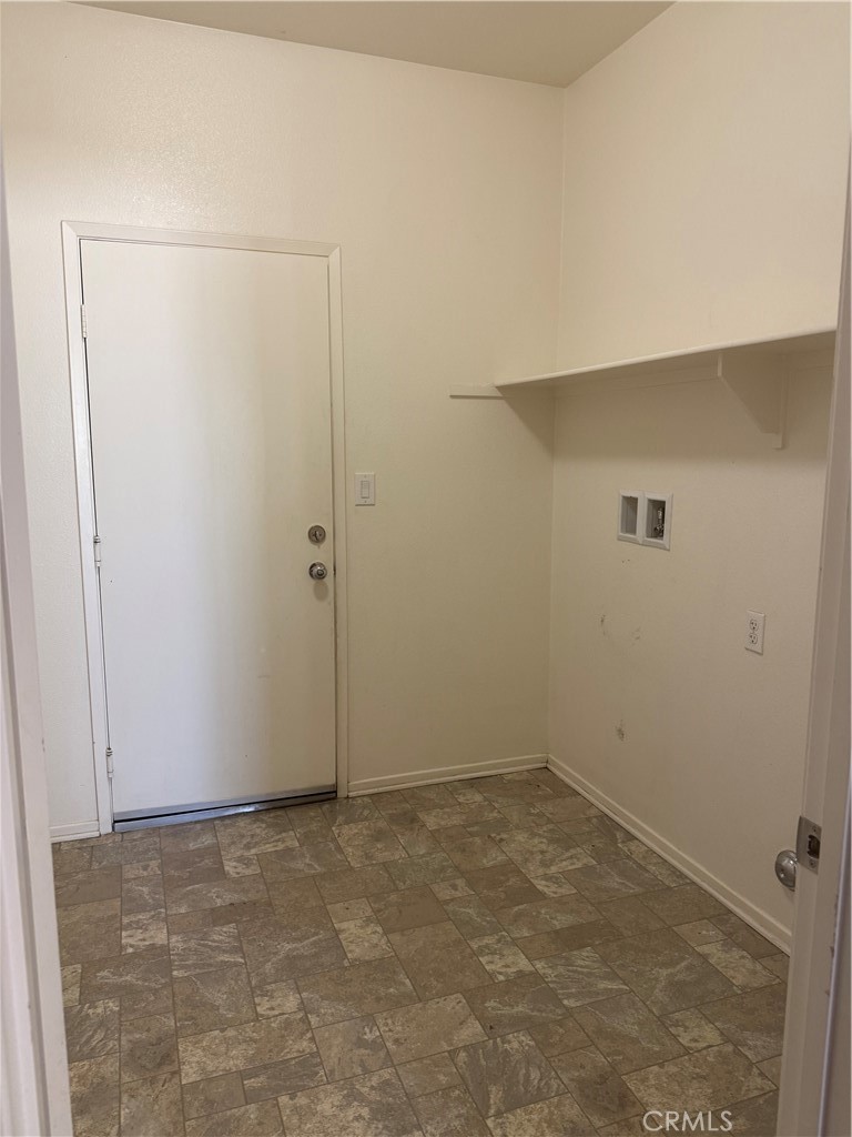 2062 Splendid Circle San Jacinto, CA 92582 - Photo 11 of 18 an empty room with a door