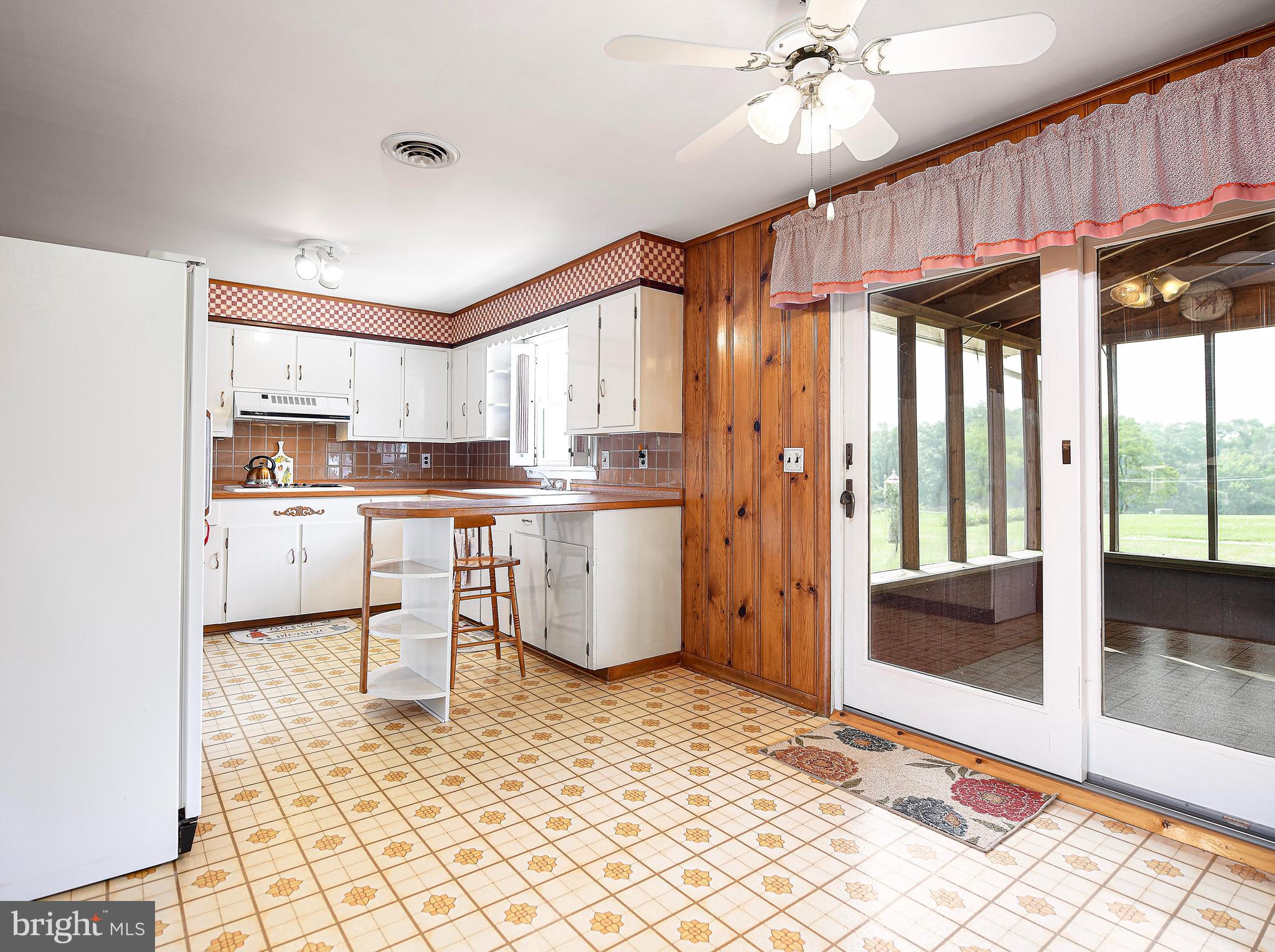 1921 Castleton Road Darlington, MD 21034 - Photo 7 of 29 Breakfast Room with slider to screened porch