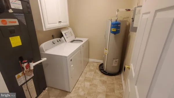 a bathroom with a sink toilet and a shower