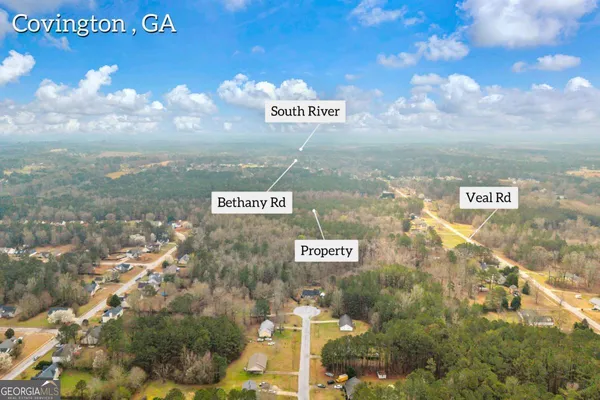 a sign that is on a brick wall