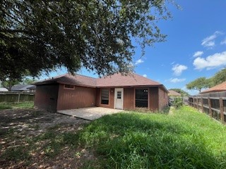 2226 Pebble Beach Drive Ingleside, TX 78362 - Photo 35 of 36 a front view of house with yard and trees