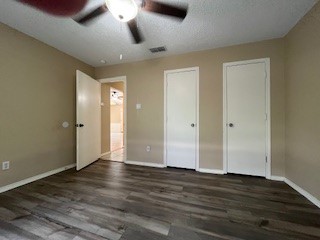 2226 Pebble Beach Drive Ingleside, TX 78362 - Photo 6 of 36 an empty room with wooden floor and windows