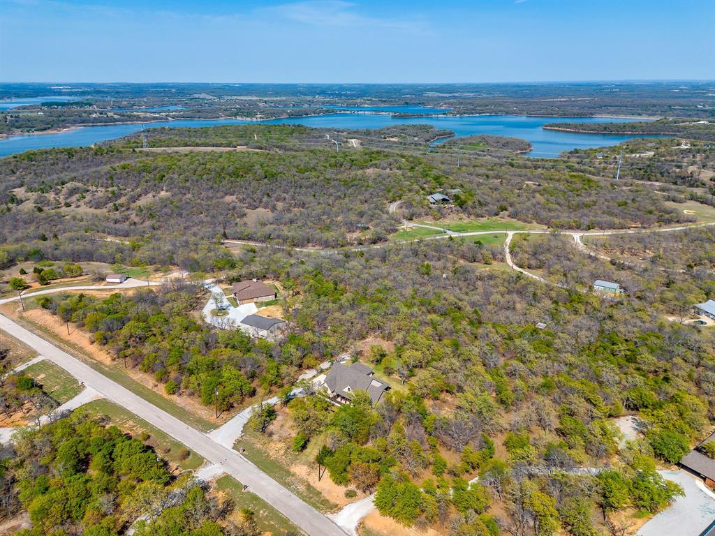 322 Mountainview Court Sunset, TX 76270 - Photo 2 of 40 a view of an ocean and beach