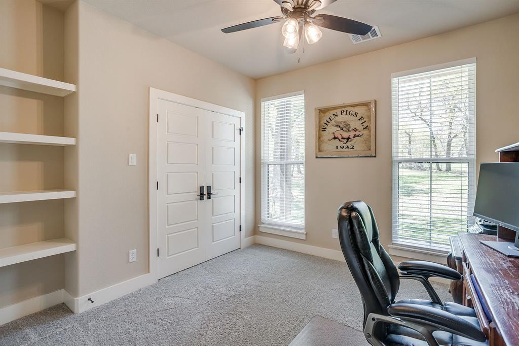 322 Mountainview Court Sunset, TX 76270 - Photo 31 of 40 a view of a workspace with furniture and a window